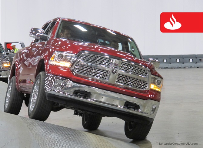 A RAM truck rolls through a ride-and-drive event at the DFW Auto Show.