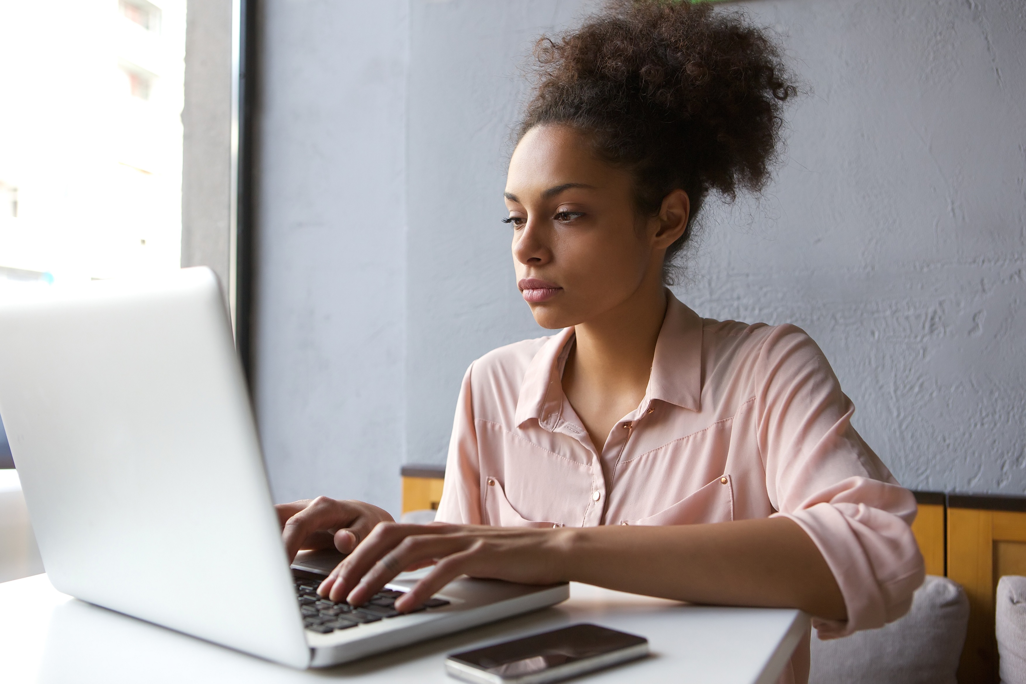 Young woman on computer