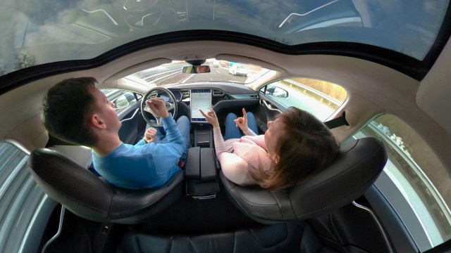 Couple in self-driving vehicle