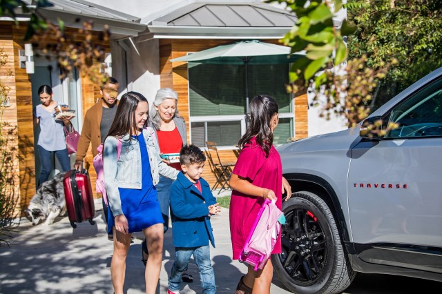 Family leaving house