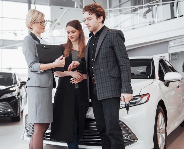 Woman selling a car