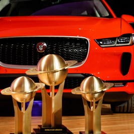 Jaguar I-PACE with three trophies