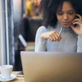 Woman working on financial health on computer