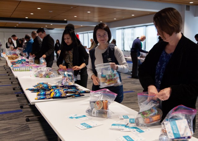 SC volunteers filling care bags for homeless