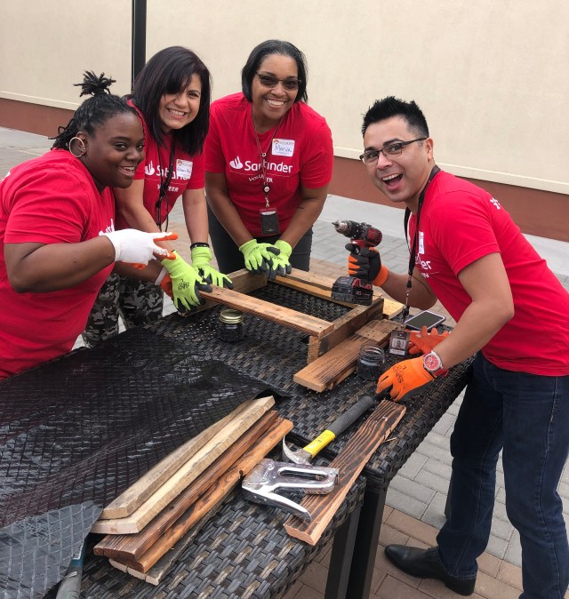 Four SC volunteers working on pallet garden