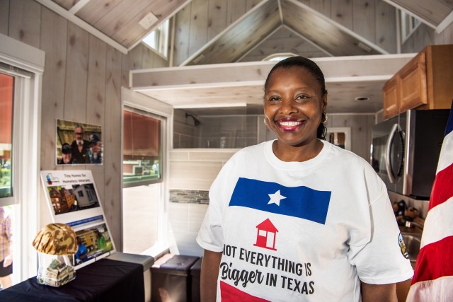 Woman inside a tiny house