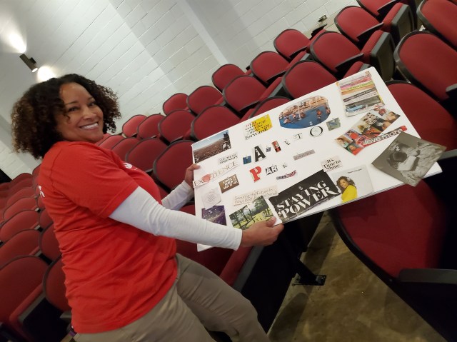 Volunteers show off vision board